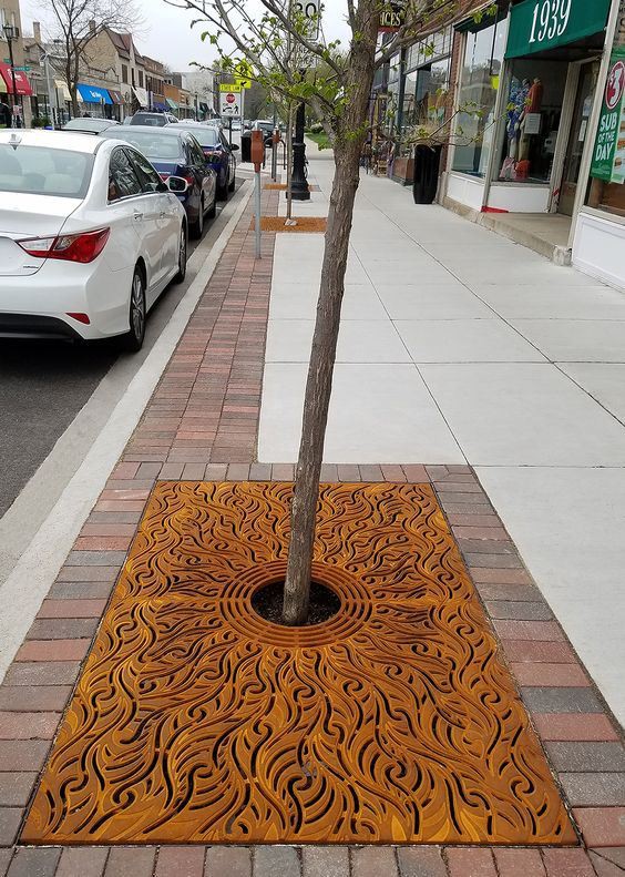 Round Tree Grate Outside Sidewalk